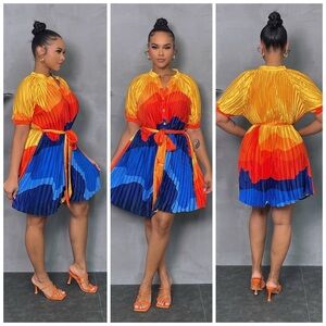 Colorful pleated beautiful dress.  Comes with the belt run very comfortable